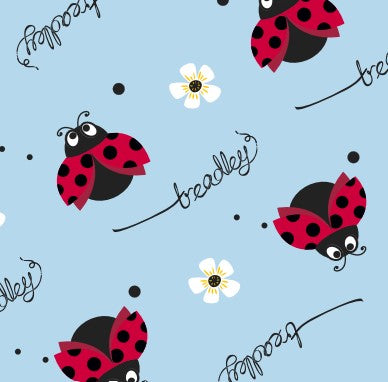 Treadley fabric of ladybugs and flowers on a light blue background 